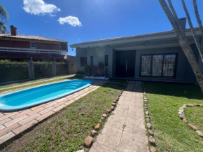 Casa para-vaneio em Atlântida